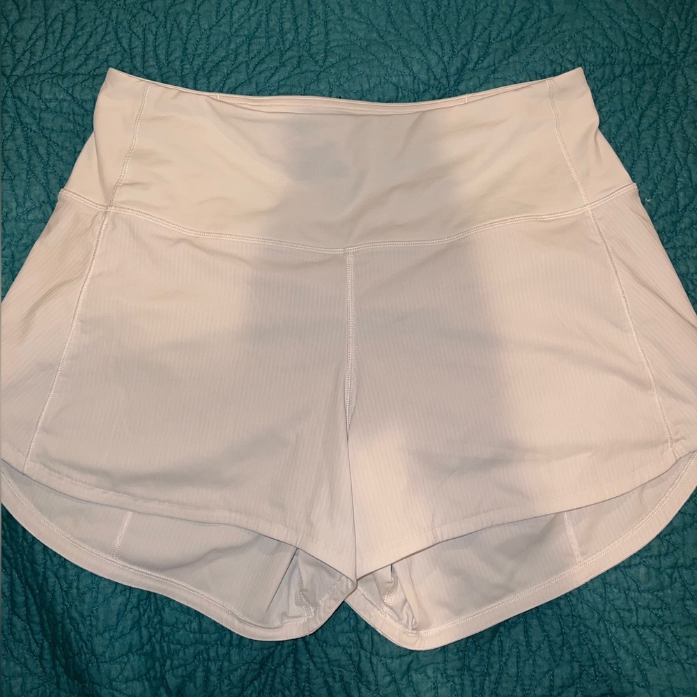 White Lululemon Speed-Up shorts